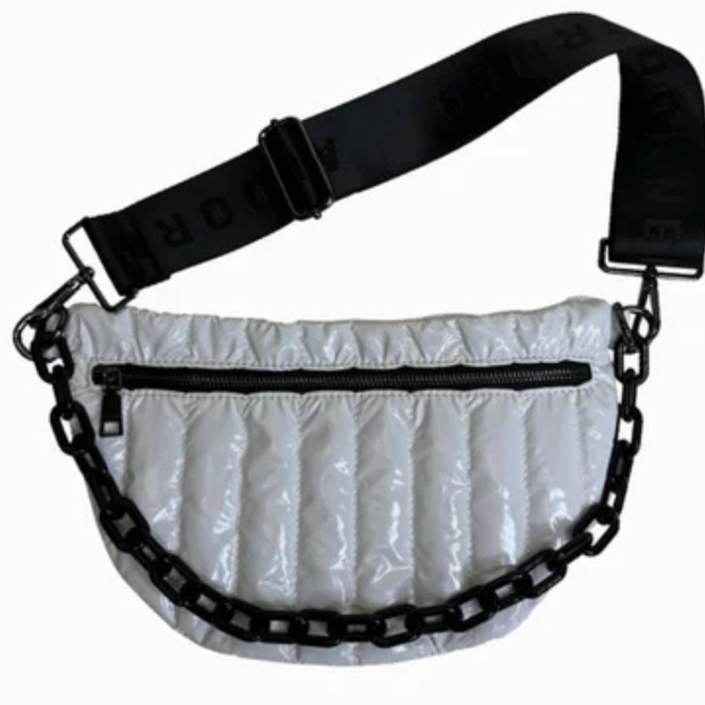 Silver Crossbody fanny pack with black hardware and black thick Crossbody strap